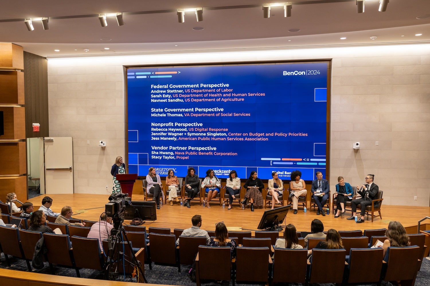 Eleven leaders from the federal government, state government, nonprofits, and vendor partners giving a panel.